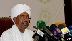 FILE – The International Criminal Court has suspended its probe of Sudanese President Omar al-Bashir, accused of orchestrating genocide and crimes against humanity.