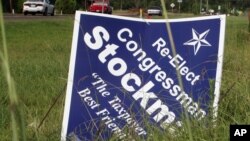 This July 10, 2012, photo shows a campaign sign in Orange, Texas, for Republican congressional candidate Stephen Stockman.