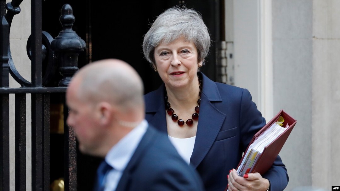 Britain's Prime Minister Theresa May leaves 10 Downing Street in London on November 14, 2018, to attend the weekly Prime Minister's Questions at the Houses of Parliament.