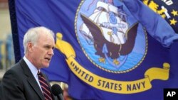 FILE - Navy Secretary Richard Spencer delivers a speech at the U.S. Naval base in Yokosuka, southwest of Tokyo, July 12, 2018. A federal judge in Connecticut certified a class-action lawsuit Thursday against Spencer.