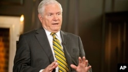 FILE - Former U.S. defense secretary Robert Gates.