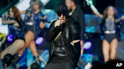 FILE - Singer Daddy Yankee performs during the Latin Billboard Awards in Coral Gables, Florida, April 28, 2016.