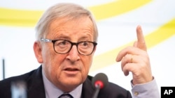 FILE - Jean-Claude Juncker, president of the European Commission, speaks during a visit to the Landtag of Baden-Württemberg in Stuttgart, Germany, Feb. 19,2019. 