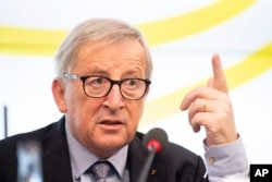 FILE - Jean-Claude Juncker, President of the European Commission, speaks during a visit to the Landtag of Baden-Württemberg, Feb. 19,2019, in Stuttgart, Germany.