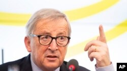 FILE - Jean-Claude Juncker, President of the European Commission, speaks during a visit to the Landtag of Baden-Württemberg, Feb. 19, 2019, in Stuttgart, Germany. 