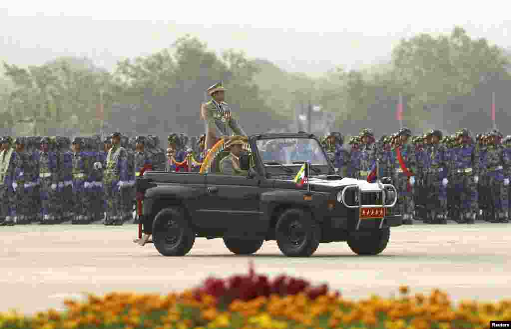 2013年3月27日，缅甸在首都内比都举行建军68周年阅兵，缅甸国防军总司令敏昂莱大将检阅部队。