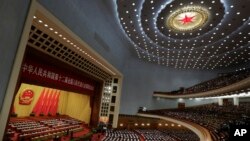 Photo d'archives: séance d'ouverture du Congrès national du peuple au Grand Palais du Peuple à Beijing, le 5 mars 2016.