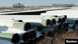FILE - A depot used to store pipes for TransCanada Corp.'s planned Keystone XL oil pipeline is seen in Gascoyne, North Dakota, Nov. 14, 2014. 