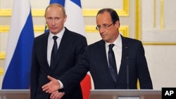 Rusya Devlet Başkanı Vladimir Putin ve Fransa Cumhurbaşkanı François Hollande