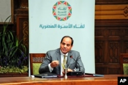 FILE - Egyptian President Abdel-Fattah el-Sissi, speaks during a live broadcast, in Cairo, Egypt, April 13, 2016. El-Sissi sought to defuse opposition started by his declaration to hand over control of two Red Sea islands to Saudi Arabia.