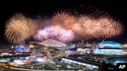Fireworks explode over Olympic Park at the end of the closing ceremony for the 2014 Winter Olympics, Feb. 23, 2014.