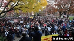 A large crowd gathers during a protest over some of President-elect Donald Trump policies and to ask school officials to reject some of his plans at Rutgers University.