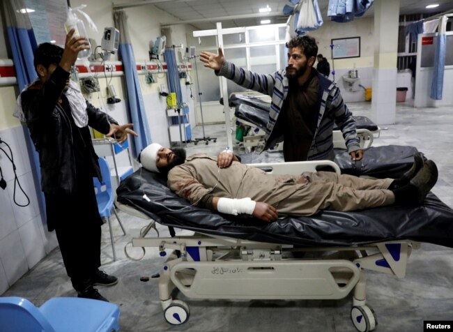 An Afghan injured man receives treatment at a hospital after a car bomb blast in Kabul, Afghanistan, Jan. 14, 2019.
