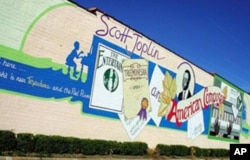 This mural, saluting legendary ragtime-music composer Scott Joplin, decorates a building on the Texas side of Texarkana, where he was born.