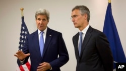 U.S. Secretary of State John Kerry, left, meets with NATO Secretary General Jens Stoltenberg at NATO headquarters in Brussels, June 27, 2016.