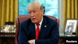 Le président des États-Unis, Donald Trump, lors de l'interview accordée à Reuters dans le bureau ovale de la Maison Blanche à Washington, le 20 août 2018.