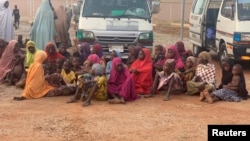 FILE - Abducted women and children in the northwestern state of Zamfara are rescued by Nigerian security agents on October 7, 2021 in Zamfara, Nigeria.