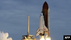 The space shuttle Atlantis lifts off from the Kennedy Space Center Friday, July 8, 2011, in Cape Canaveral, Fla. Atlantis is the 135th and final space shuttle launch for NASA. (AP Photo/John Raoux)