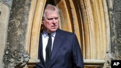 FILE - Britain's Prince Andrew appears at the Royal Chapel at Windsor, following the death announcement of his father, Prince Philip, April 11, 2021, in England.