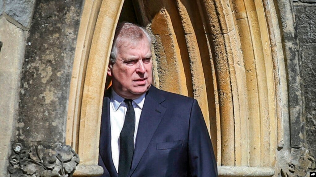 FILE - Britain's Prince Andrew appears at the Royal Chapel at Windsor, following the death announcement of his father, Prince Philip, April 11, 2021, in England.