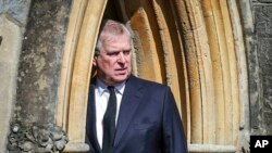 FILE - Britain's Prince Andrew appears at the Royal Chapel at Windsor, following the death announcement of his father, Prince Philip, April 11, 2021, in England.