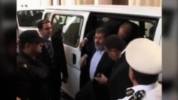 Brief Morsi Court Appearance Ends in Shouting, Protest