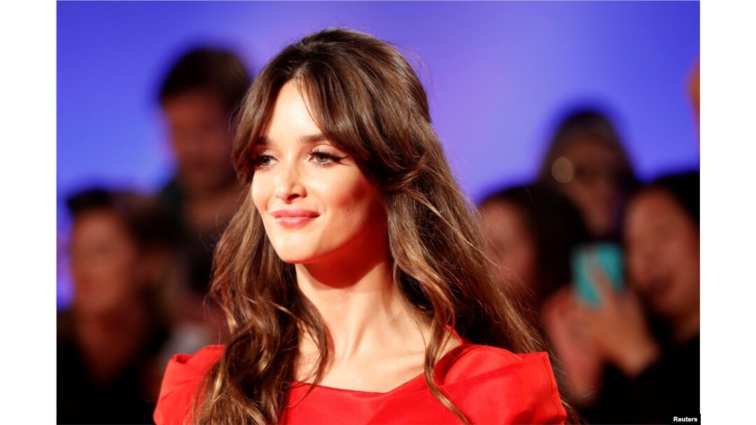 Actress Charlotte Le Bon arrives on the red carpet for the film "The Promise" during the 41st Toronto International Film Festival (TIFF), in Toronto, Canada, Sept. 11, 2016.