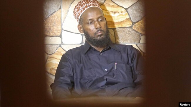 Former al-Shabab leader Mukhtar Robow attends a news conference in Baidoa, Somalia, Nov. 4, 2018. 