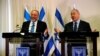 内塔尼亚胡和他的引起争议的新伙伴、以色列家园党领导人、极端民族主义者利伯曼一起在议会签署了联合协议（2016年5月25日）