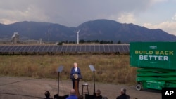 FILE - President Joe Biden speaks about infrastructure at the Flatirons campus of the National Renewable Energy Laboratory, Sept. 14, 2021, in Arvanda, Colo.