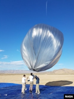 One of the balloons is being prepared for flight soon after the 2019 Ridgecrest earthquake activity. The balloons were launched from California’s Mojave Desert and allowed to pass over the area. (Photo Credit: NASA/JPL-Caltech)