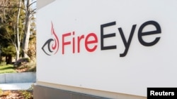 Security firm FireEye's logo is seen outside the company's offices in Milpitas, California.