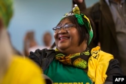 A supporters of the ruling African National Congress (ANC) attends a campaign meeting with the South African president and president of the ANC, in Mitchells Plain, Cape Town, South Africa May 3, 2019, ahead of general elections.