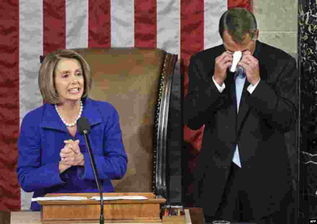 Jan 5: House Speaker-designate John Boehner of Ohio wipes away tears as he waits to receive the gavel from outgoing House Speaker Nancy Pelosi of Calif. during the first session of the 112th Congress, on Capitol Hill in Washington. (Charles Dharapak/AP)