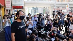 Richard Tsoi, secretary of the Hong Kong Alliance in Support of Patriotic Democratic Movements of China, speaks to reporters after it was announced that the group would disband, in Hong Kong, Sept. 25, 2021.