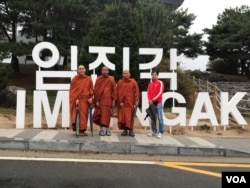 Cambodian monks visit North and South Korean Boder on Friday, Apr 14 2017 in Imjingak Park in Paju town which is located about 48 km North of Seoul. From Right to left, Ven Rin Saro and two monks from Cambodia, and a Cambodian worker in South Korea. (Sok Khemara/VOA)