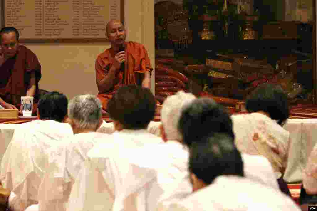 A monk is seen giving sermons during a memorial service for Khmer Rouge victims at the Wat Buddhikaram Cambodian Buddhist temple in Silver Spring, Maryland, to mark the 40th anniversary of the takeover of the Khmer Rouge, on Friday, April 17, 2015. (Sophat Soeung/VOA Khmer)