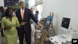 U.S. Secretary of State John Kerry during a tour of a Sustainable Investment in Sub-Saharan Africa in Kinshasa, DRC, May 3, 2014.