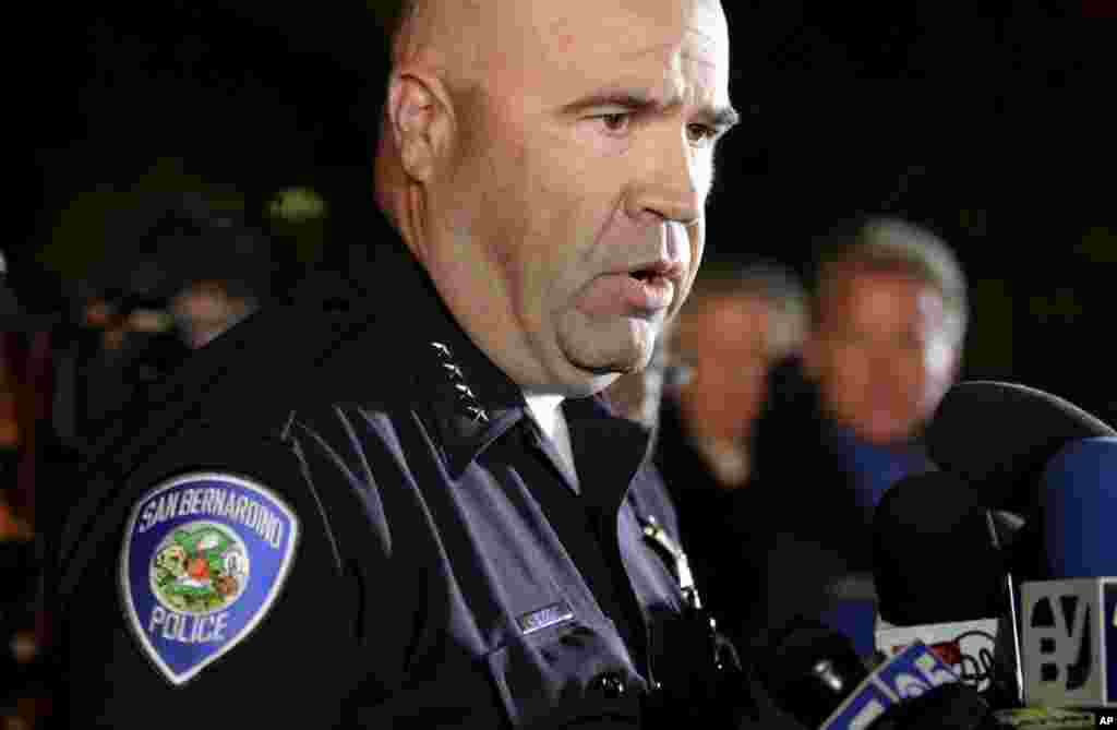 San Bernardino Police Chief Jarrod Burguan (C) speaks at a news conferenece, informing the media, that the couple Syed Rizwan Farook, 28, and Tashfeen Malik, 27, were responsible for the shooting rampage at the Inland Regional Center, in San Bernardino, Dec. 2, 2015.