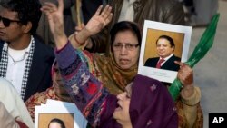 FILE - Supporters of former Pakistani Prime Minister Nawaz Sharif shout slogans against the government outside an accountability court in Islamabad, Dec. 24, 2018. 