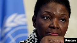 FILE - Valerie Amos, Under-Secretary-General and Emergency Relief Coordinator at the United Nations Office for the Coordination of Humanitarian Affairs, pauses during a news conference at UN headquarters in Geneva on February 19, 2013.