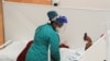 Pessoal da MSF no tratamento da Covid-19.