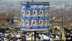An advertisement tank is plastered with posters of former military ruler Muhammadu Buhari and his running mate Tunde Bakare during the Congress for Progressive Change (CPC) presidential campaign rally at Mapo square, Ibadan, south-west Nigeria, Mar 14 20