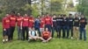 Members of Cornell University's Alpha Lambda Mu fraternity gather for an end-of- school year barbecue at the college's New York campus.