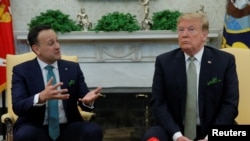 U.S. President Donald Trump listens while meeting with Ireland's Prime Minister (Taoiseach) Leo Varadkar in the Oval Office of the White House in Washington, U.S., March 14, 2018.
