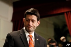 FILE - House Speaker Paul Ryan of Wis., departs after speaking to the media after a Republican caucus meeting on Capitol Hill.