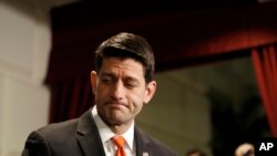 FILE - House Speaker Paul Ryan of Wis., departs after speaking to the media after a Republican caucus meeting on Capitol Hill.