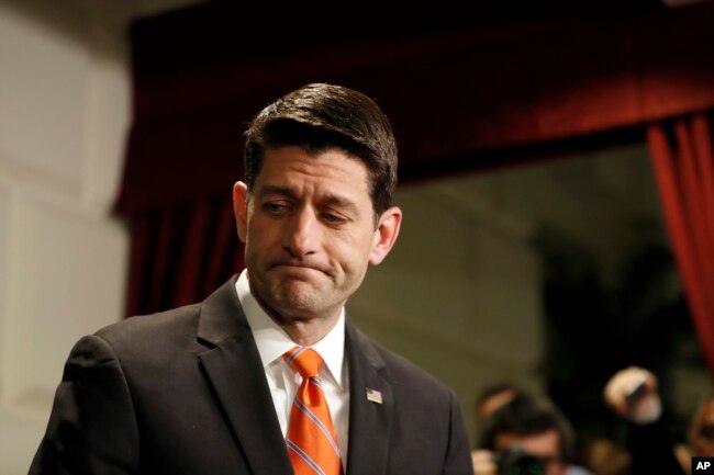 FILE - House Speaker Paul Ryan of Wisconsin departs after speaking to the media after a Republican caucus meeting on Capitol Hill.