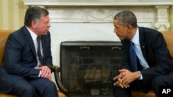 President Barack Obama, right, meets with King Abdullah II of Jordan in the Oval Office of the White House, on Tuesday, Feb. 3, 2015.