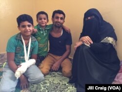 Yemeni refugees Wasiim Said Mohamed, second from right, his wife and their two children are shown in their one-room home in Hargeisa, Somaliland, March 31, 2016.